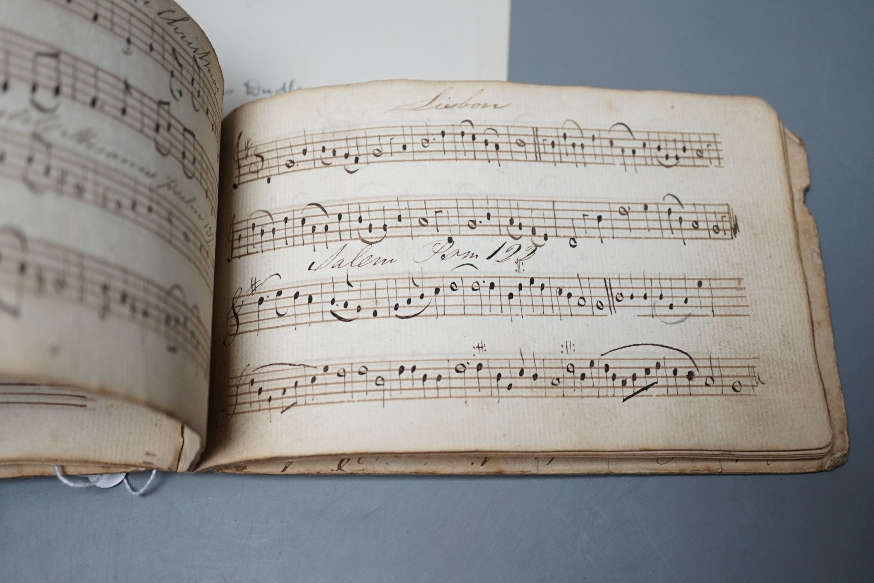An 18th century book of hand-written psalm notations, inscribed ‘John Cooper his singing book 1794’